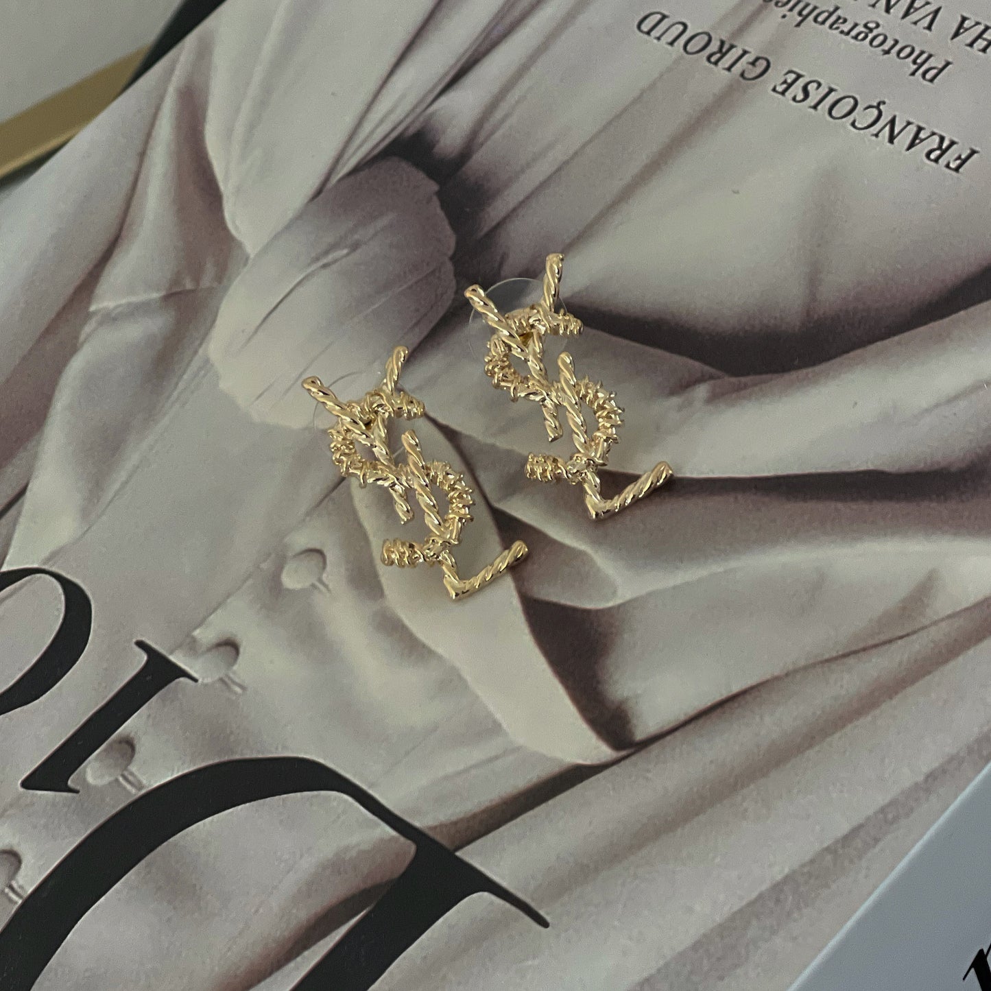 Gold ysl earrings