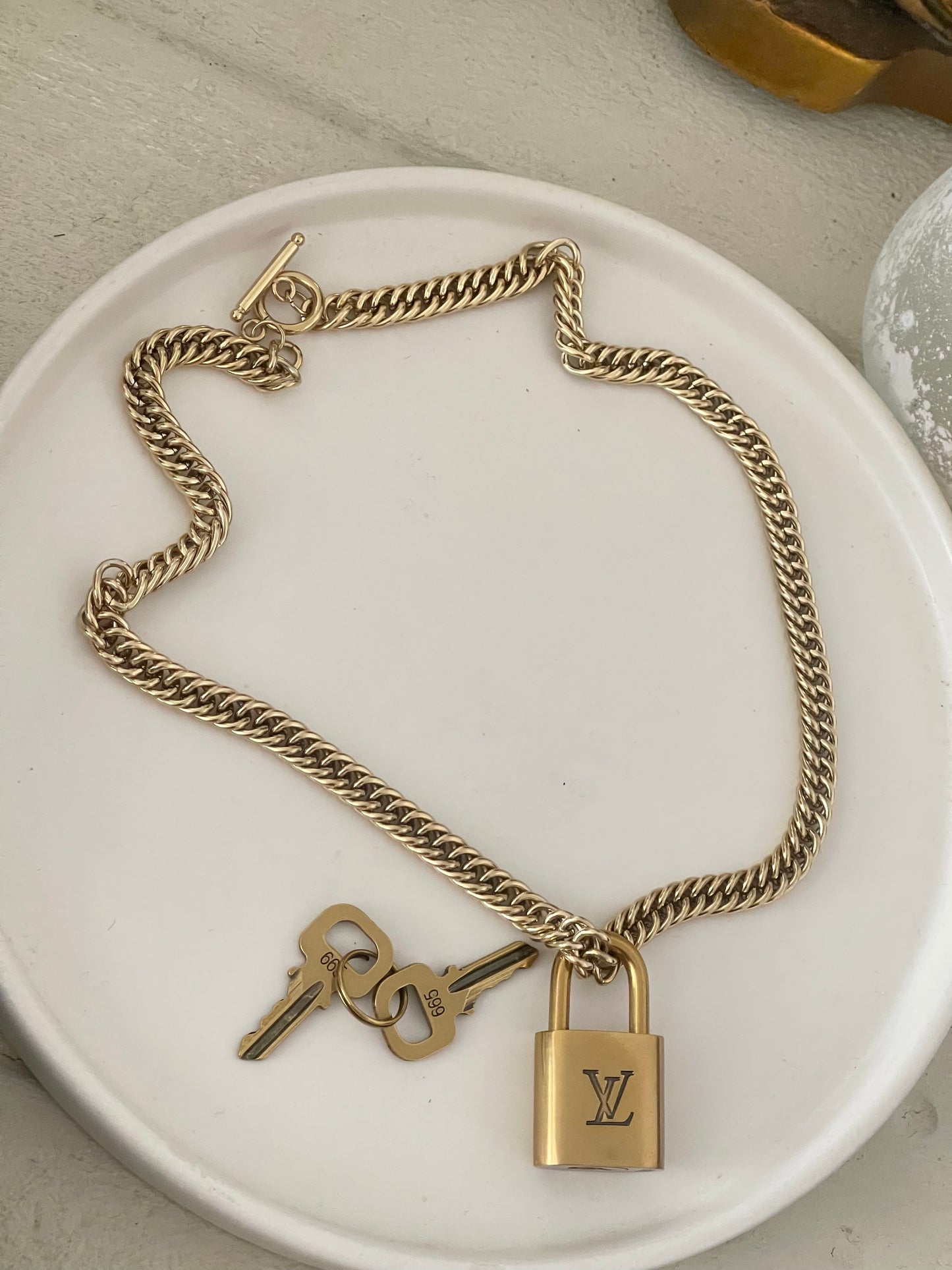 Lv lock necklace